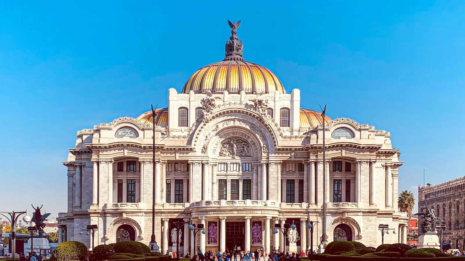 Palacio de Bellas Artes under a clear blue sky in Mexico City